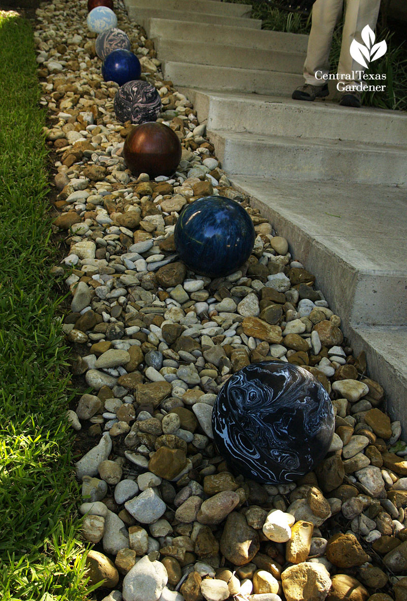 bowling balls line drainage path Lynne Dobson garden 