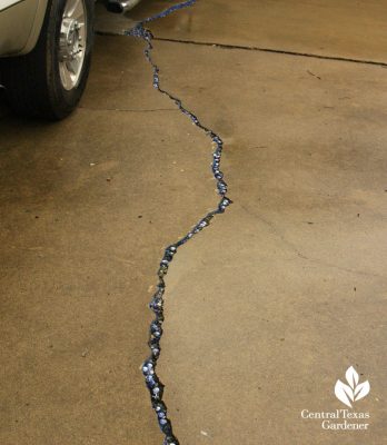 blue marbles driveway crack