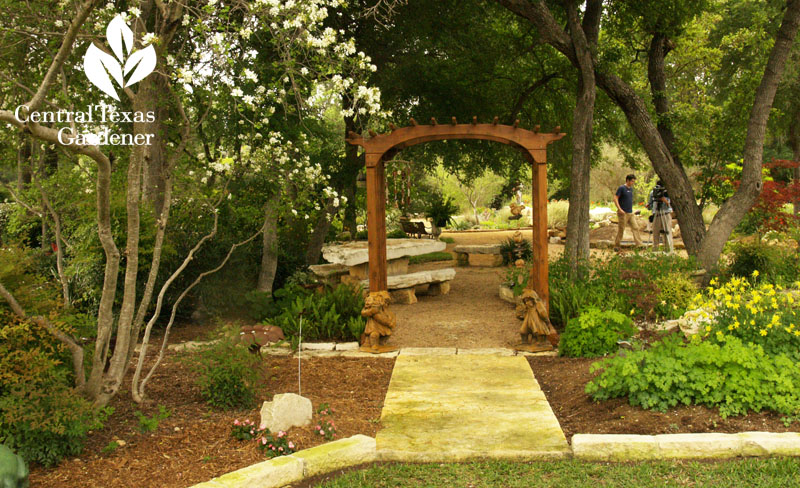 arbor into shady garden Central Texas Gardener