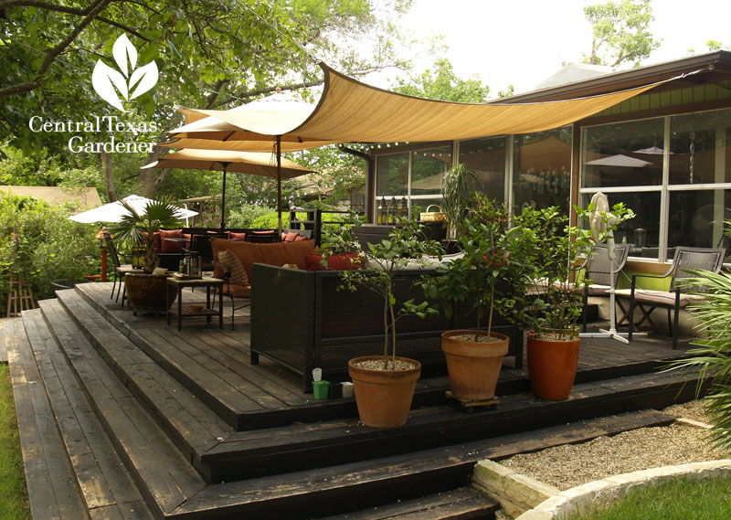 shade sails over outdoor dining and living room Central Texas Gardener