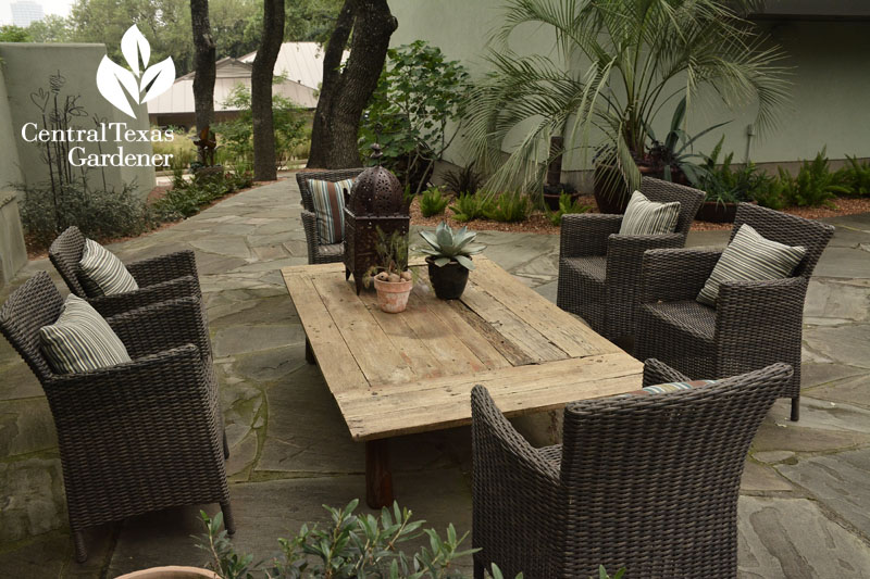 courtyard and outdoor fireplace dining room Central Texas Gardener