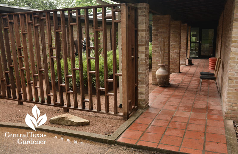 courtyard garden gates walkway to house Central Texas Gardener