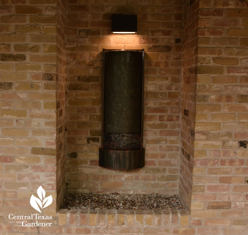 wall waterfall and lighted sconce Central Texas Gardener