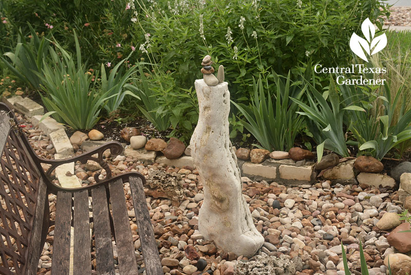 rock sculpture in reduced lawn front yard Central Texas Gardener
