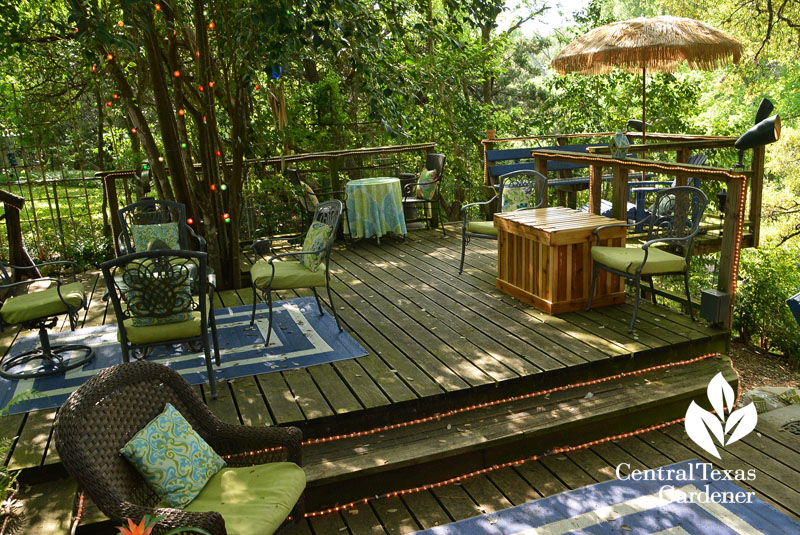 lighted patio deck under trees Central Texas Gardener