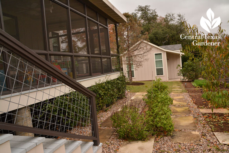 screened in porch view to vegetable gardens Central Texas Gardener