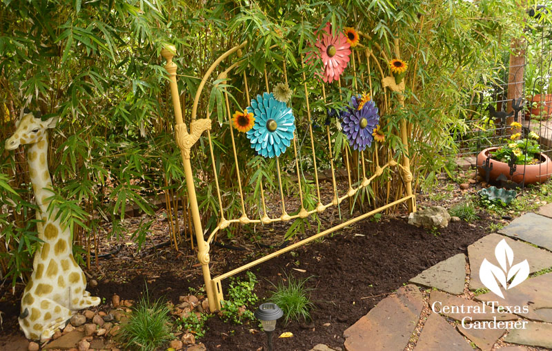 recycled head board garden entrance Central Texas Gardener