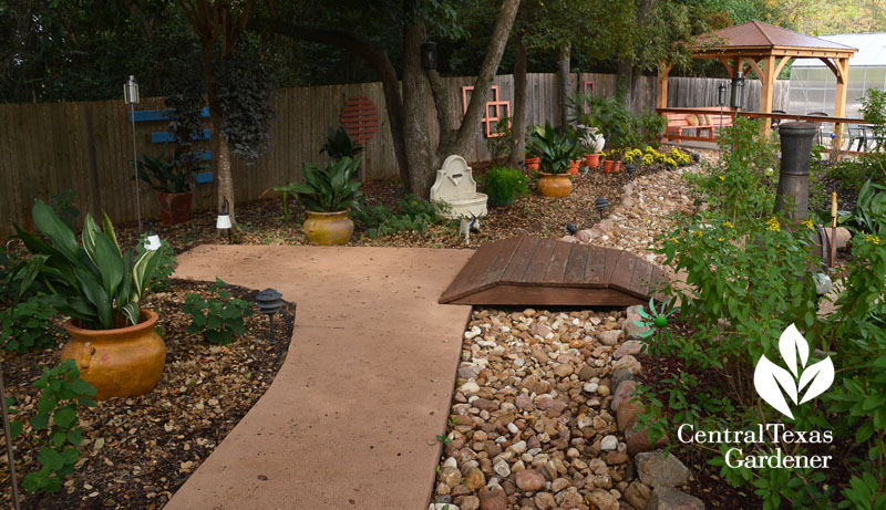 fence art dry creek sidewalk shady garden Central Texas Gardener