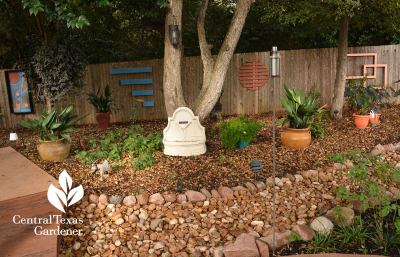 dry creek bed fence art shade garden Central Texas Gardener