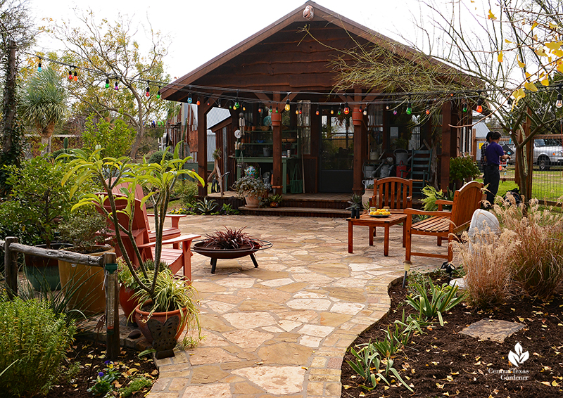 Flagstone path and patio to charming cottage style greenhouse John and Jane Dromgoole Central Texas Gardener