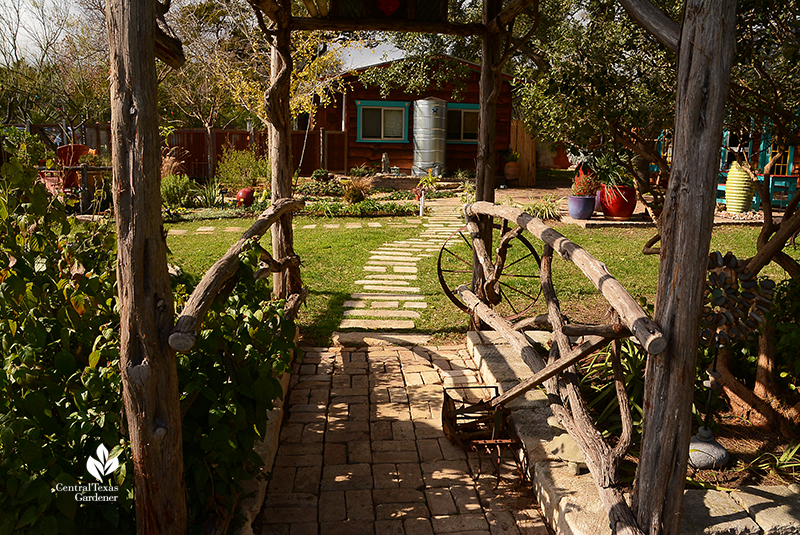 cedar arbor to stone pathway and cistern John and Jane Dromgoole Central Texas Gardener