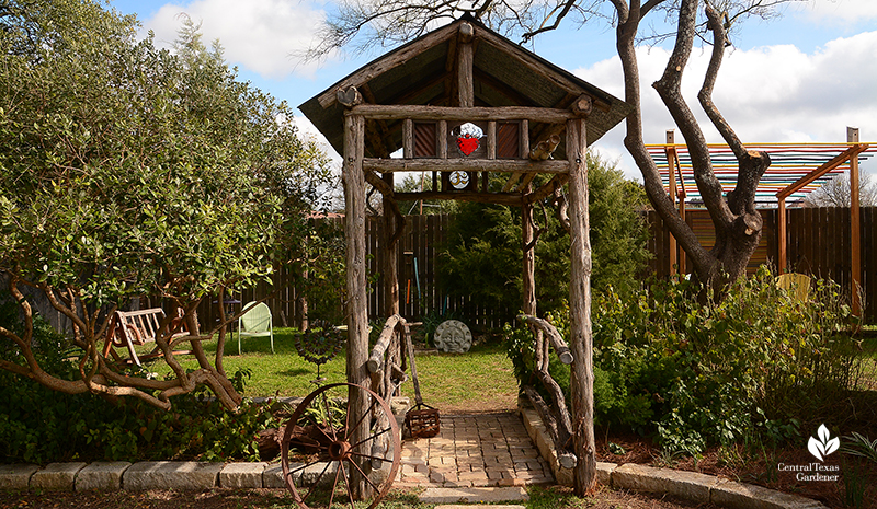 cute cedar arbor to shady cove Jane and John Dromgoole garden Central Texas Gardener