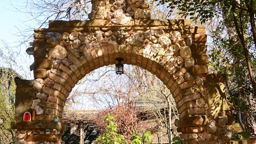Folk art stone arch Jill Nokes Garden Berthold Haas build Central Texas Gardener
