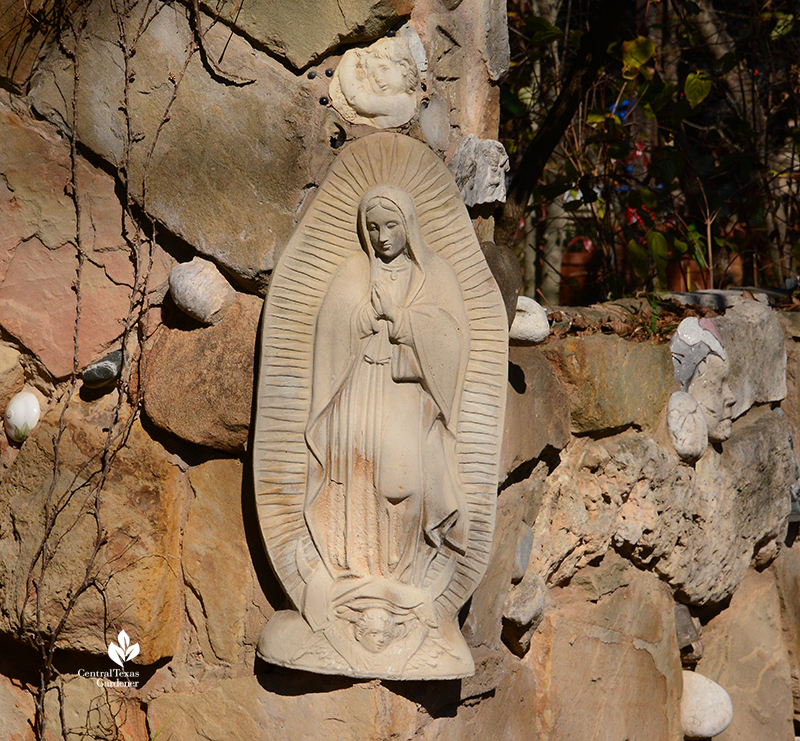 Madonna sculpture inset into folk art stone wall Jill Nokes Central Texas Gardener