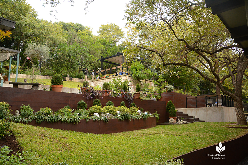 Steel plate planters elevated tiers for steep slope Duhon Harper garden 