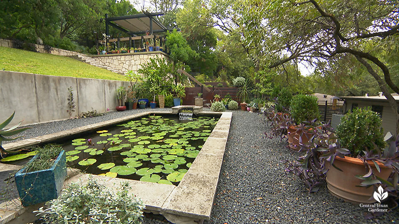 formal pond gravel parterre to stairway sloped backyard design Duhon Harper garden