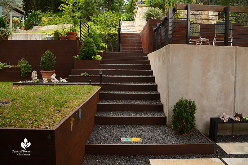 steel and gravel stairway up to living areas sloped backyard Dujon Harper