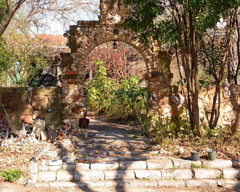 trinket swap curbside Hyde Park Jill Nokes folk art stone arch Central Texas Gardener