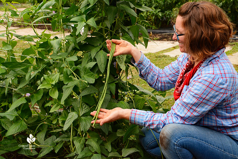 Lea Scott holds long beans