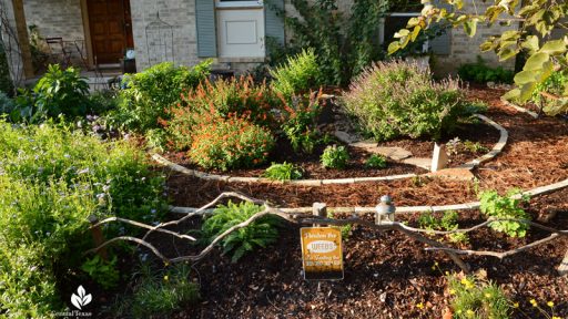 crape myrtle branch fence pollinator garden