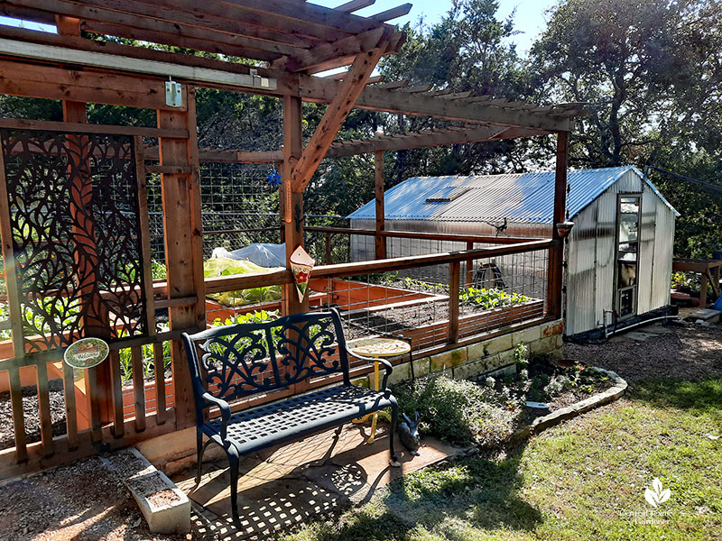 enclosed vegetable garden and greenhouse