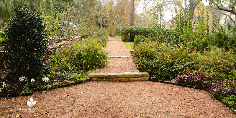 gravel patio path and plant borders
