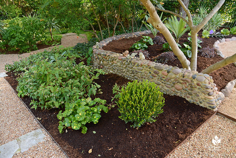 low stone wall with plants