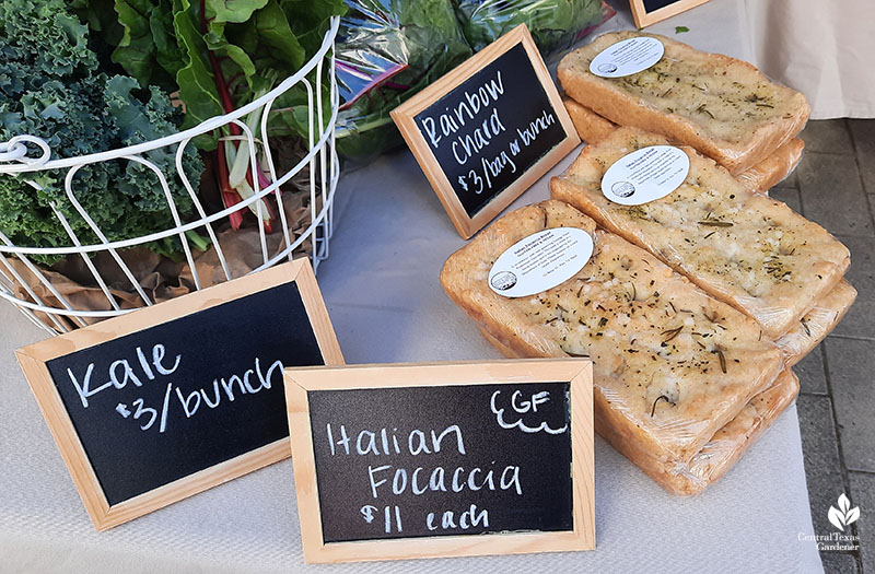 chalkboard signs for kale and gluten free focaccia with its loaves