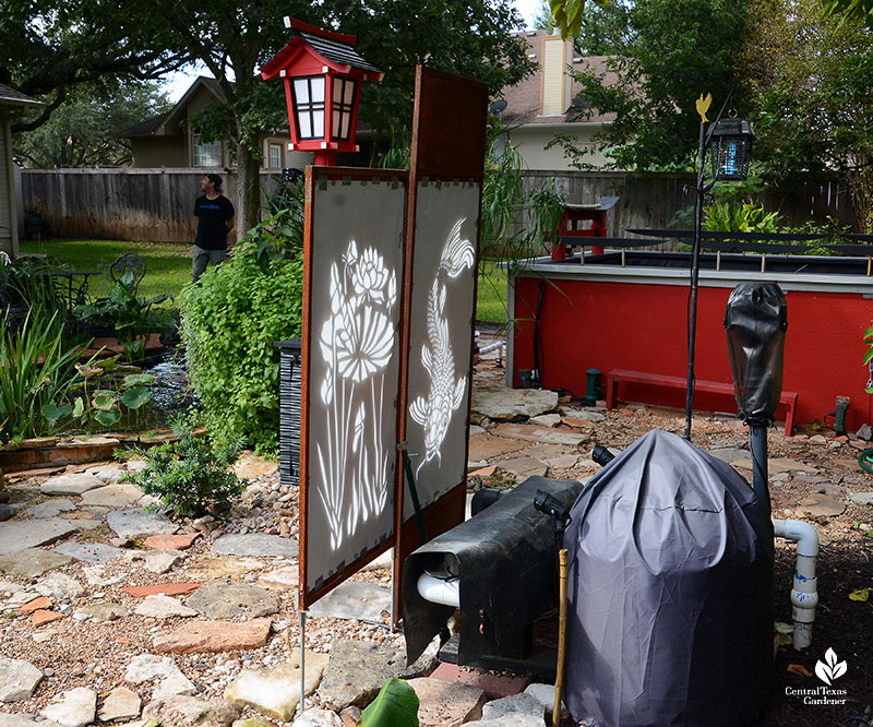 paper backing on metal screens in front of pond pump apparatus