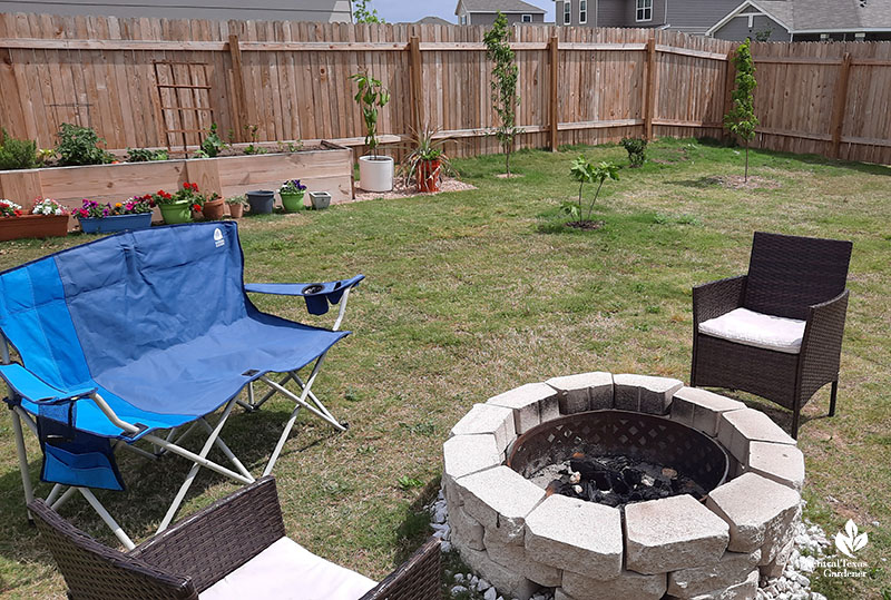 firepit raised beds lawn