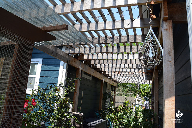 pergola and silvery hanging teardrop art