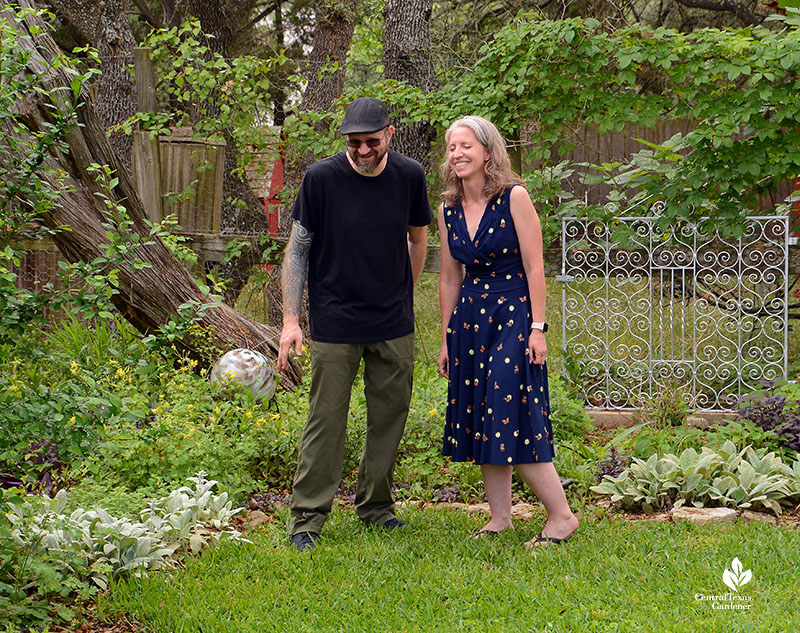 man and woman laughing in garden