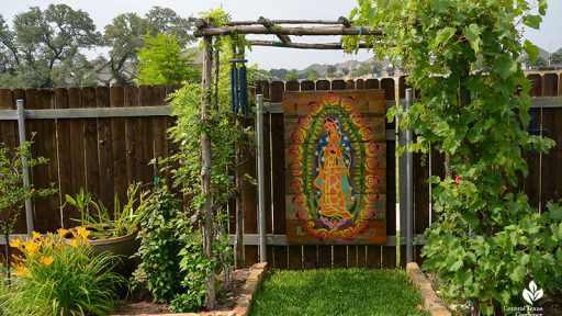 cedar grape arbor Lady of Guadalupe panel on gate