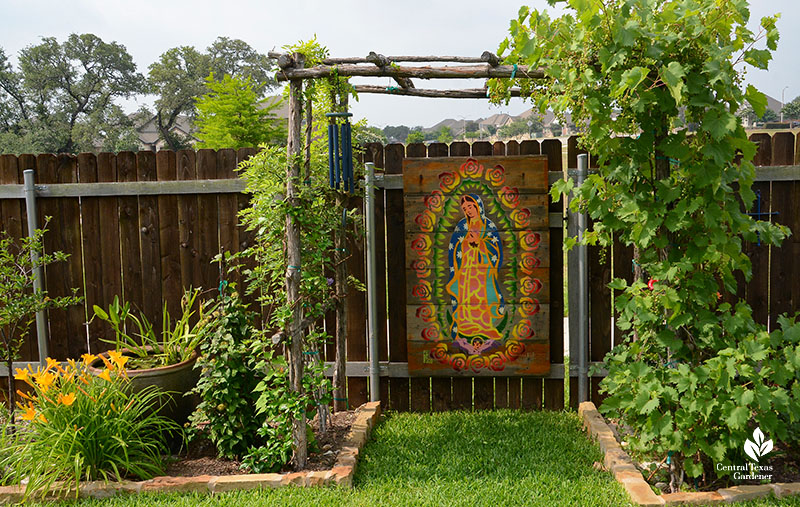 cedar grape arbor Lady of Guadalupe panel on gate