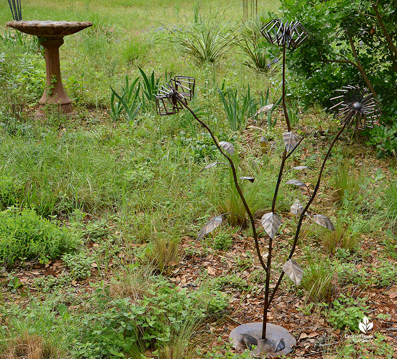 metal sculpture to resemble flowering plant