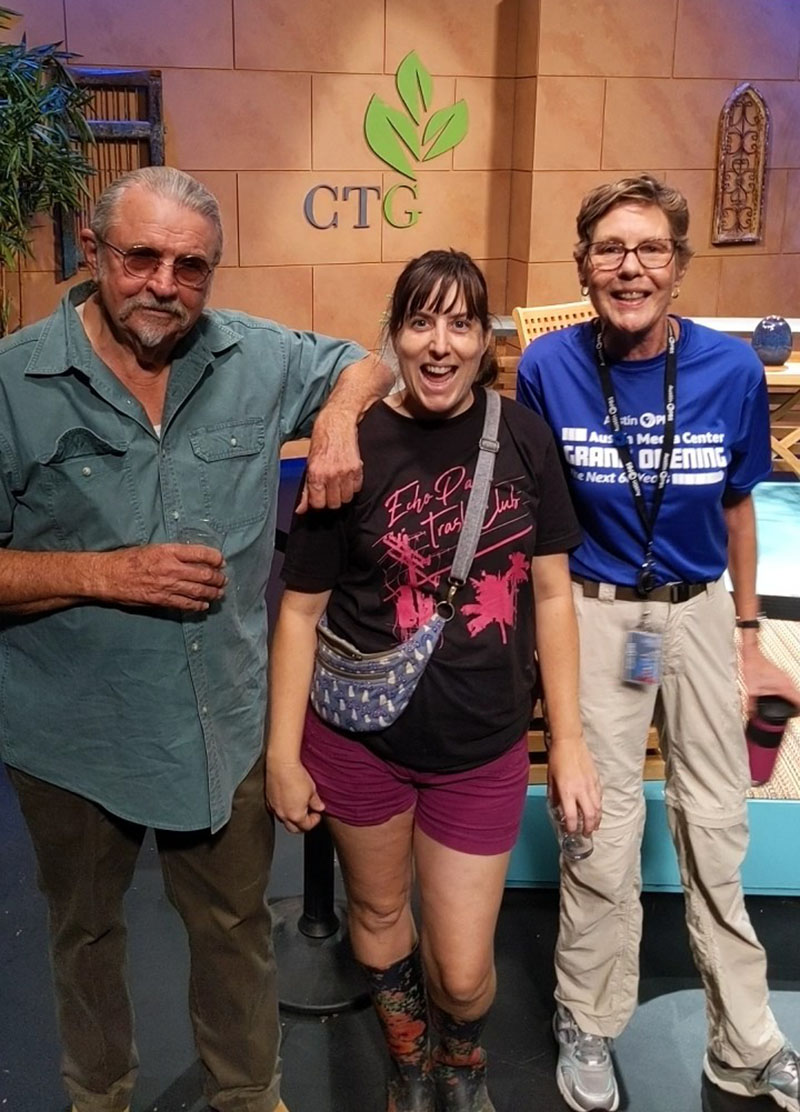 man with two smiling women on CTG studio set