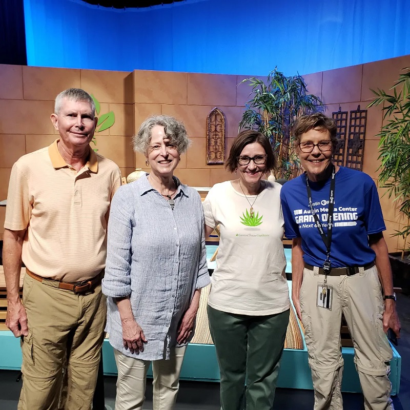 man and three women all smiling at CTG studio set