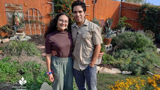 woman and man in backyard garden