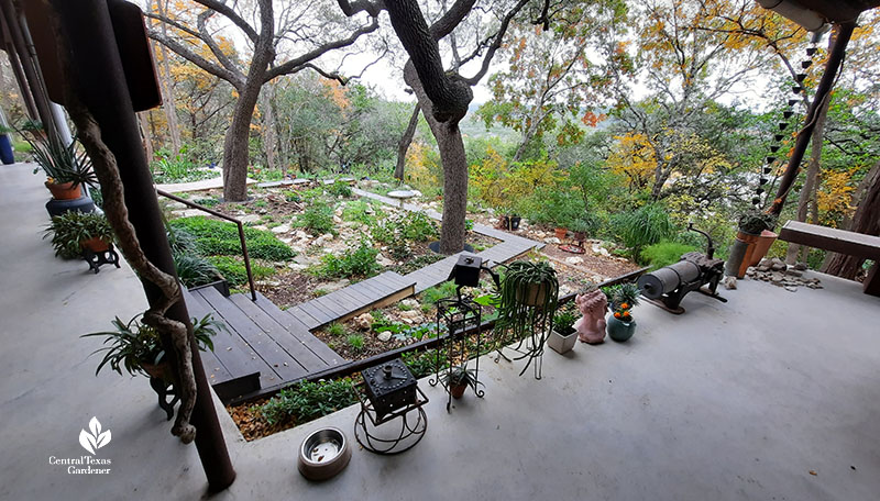 covered patio to hilltop landscape overlooking tree-covered view