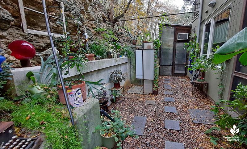 outdoor shower built against a cliff 