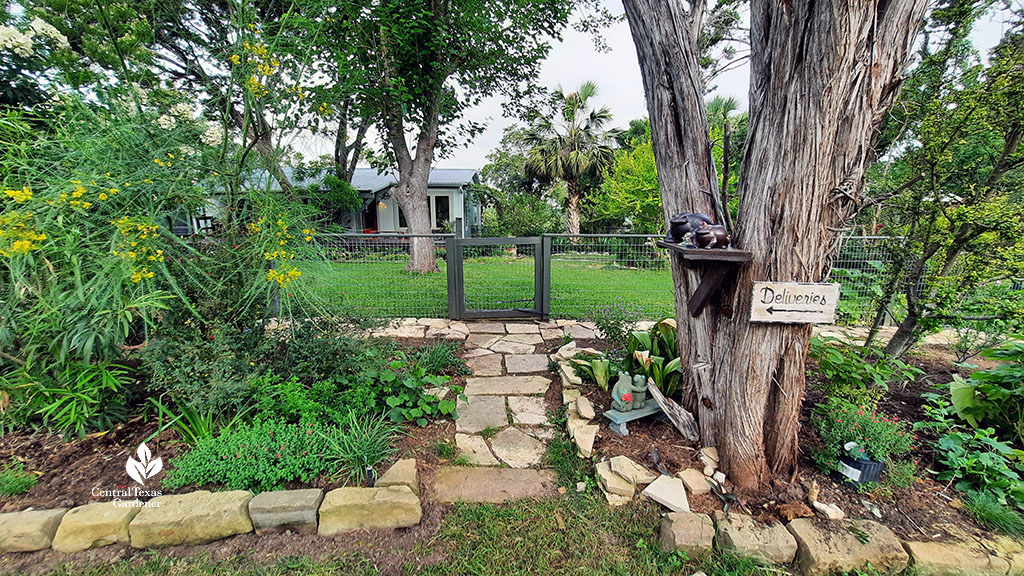 flagstone path to low fence and front yard 