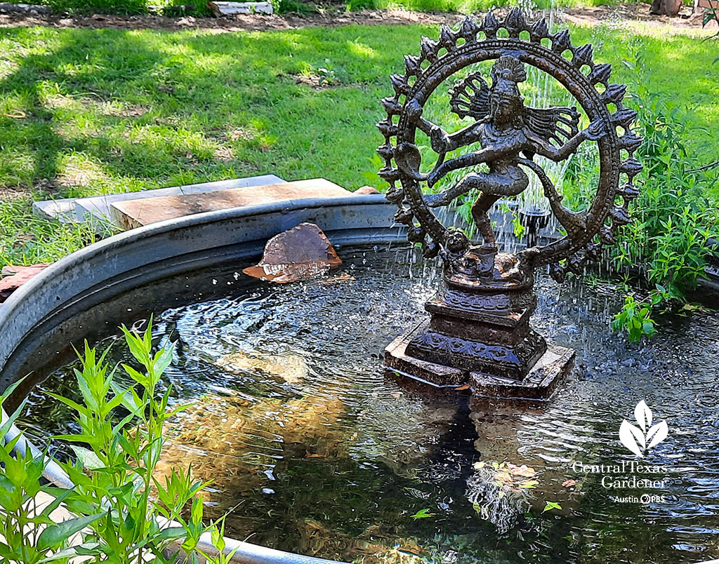 intricate figurine in ornamental metal circle