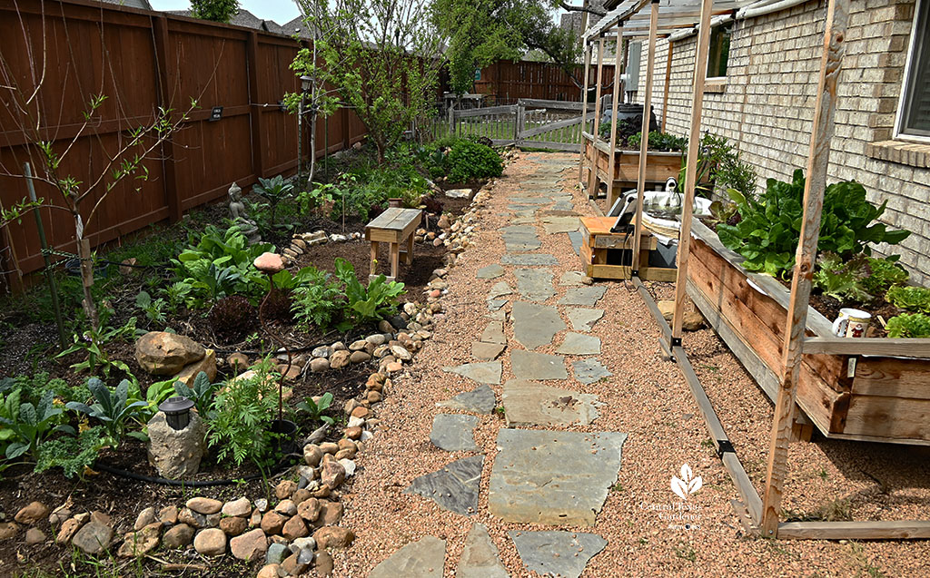 raised wicking bed against side of house