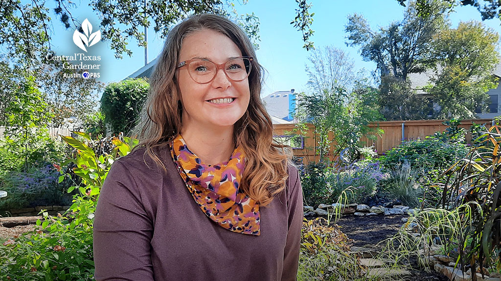 smiling woman in colorful backyard