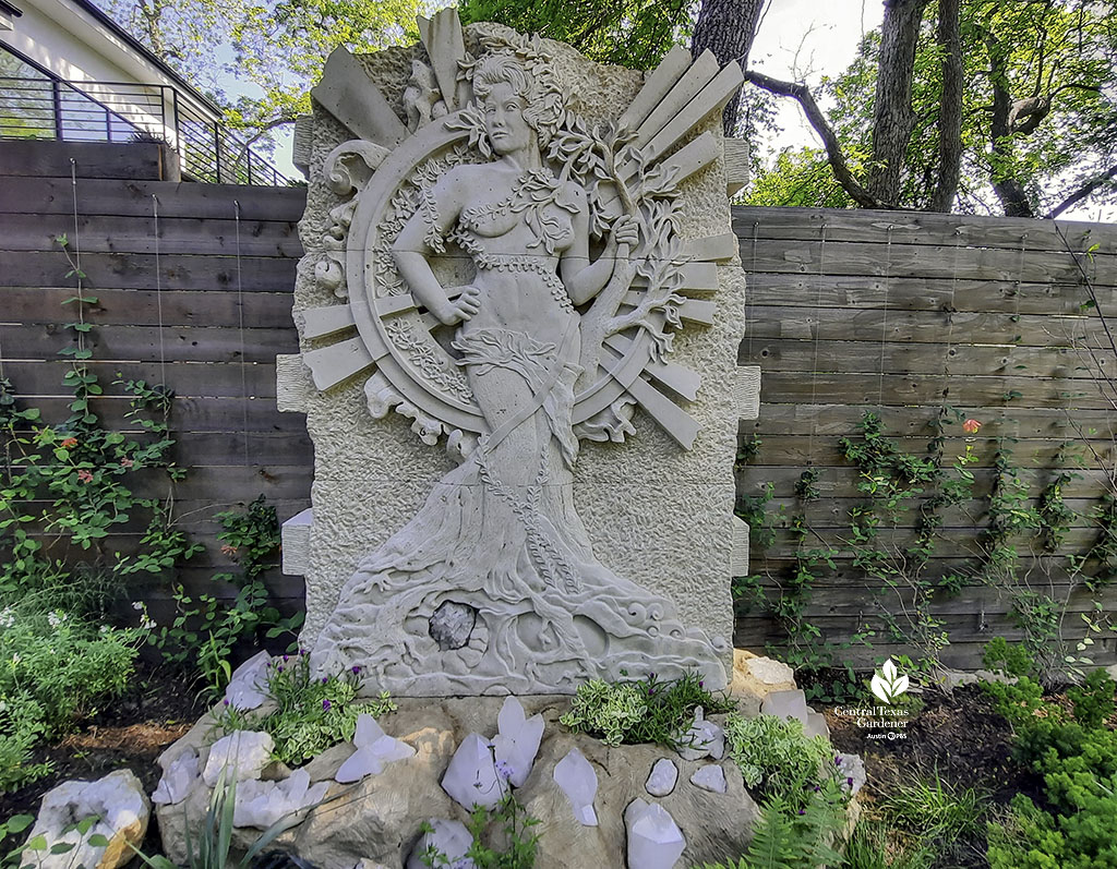 life-sized stone sculpture of woman 