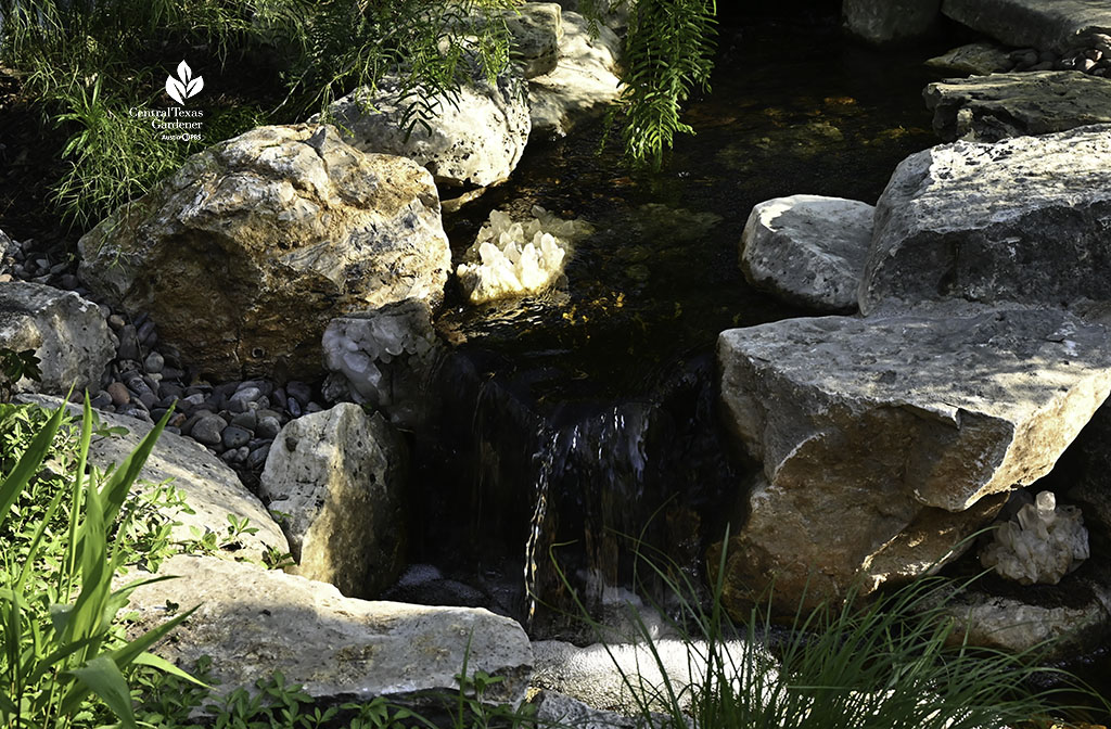 large quartz crystal glowing in stream bed sunlight  