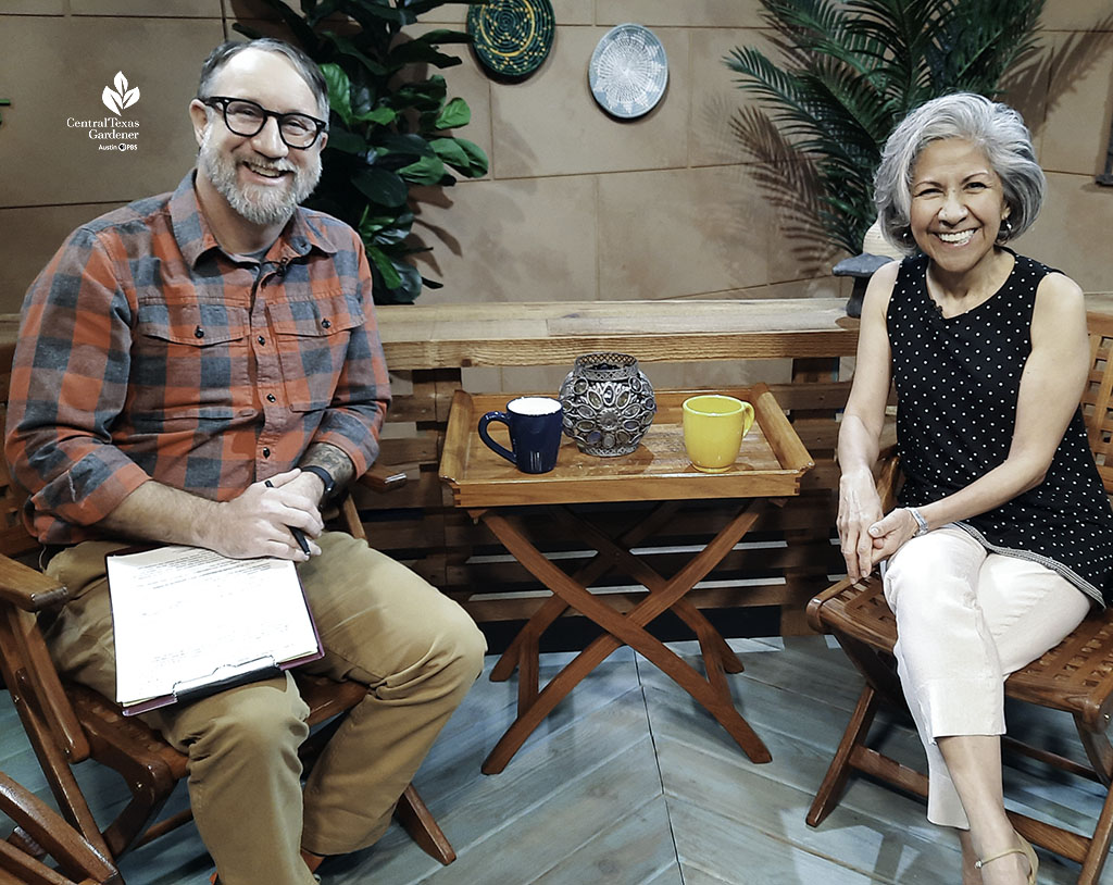 smiling man and woman on TV set 