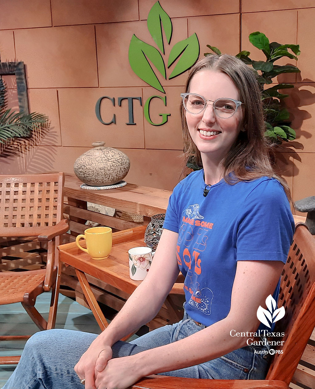 woman in blue t-shirt on CTG set