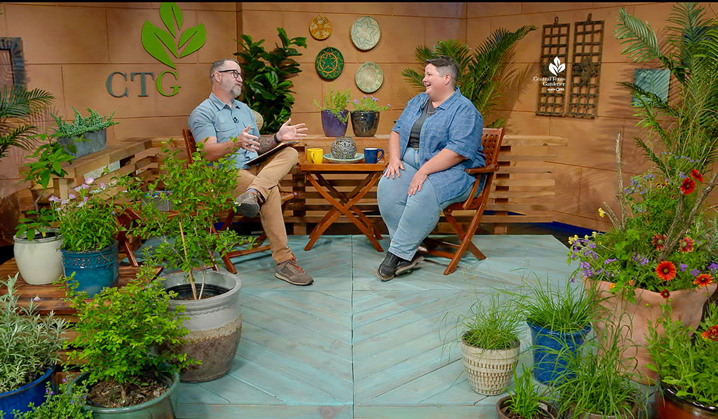 man and woman on CTG studio set with plants
