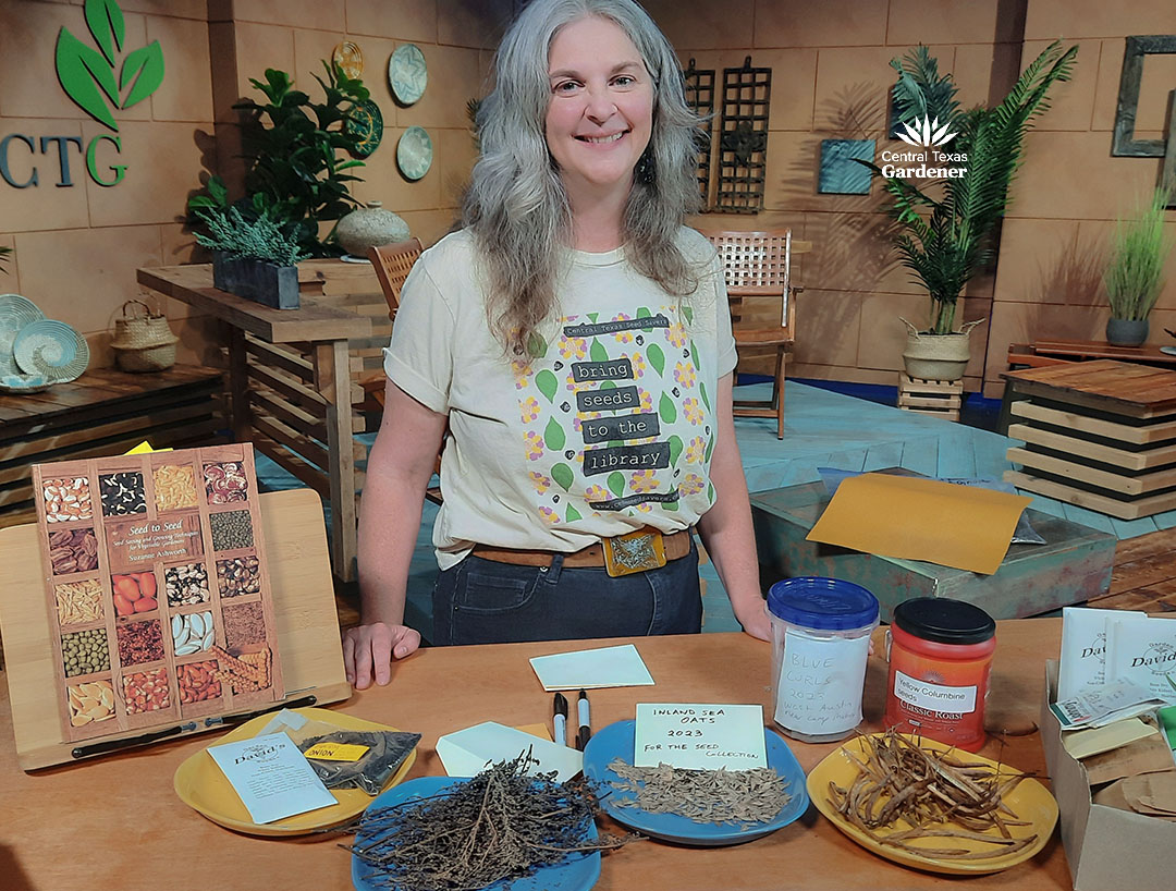 Colleen on CTG set behind table of seeds and books 